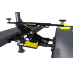 6,000-lb. BendPak bridge jack equipped with stainless-steel zinc-plated rollers for smooth movement along four-post lift runways.