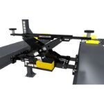 Compact BendPak RJ45W bridge jack with rubber contact pads and stackable adapters for lifting cars, trucks, and SUVs.