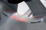 Split-weight mode on the Hofmann wheel balancer showing precise hidden weight placement for optimal balance and a clean wheel appearance
