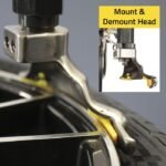 Close-up of the Ranger R76ATR’s alloy-steel mount and demount head designed for smooth tire removal while protecting delicate wheel surfaces